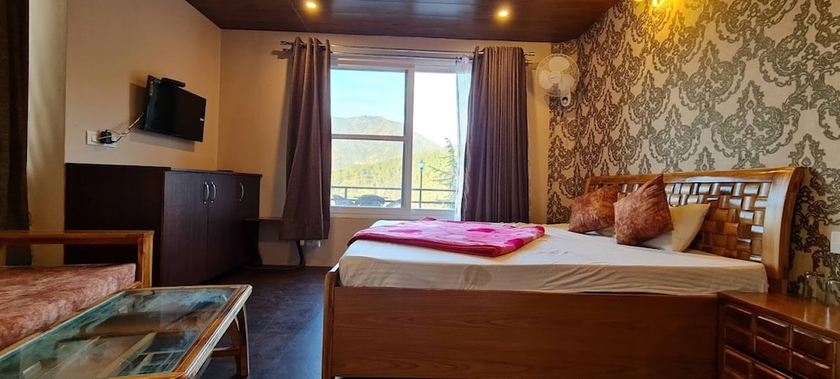 Imagen de la habitación del Hotel Rashal Homes Shimla. Foto 11