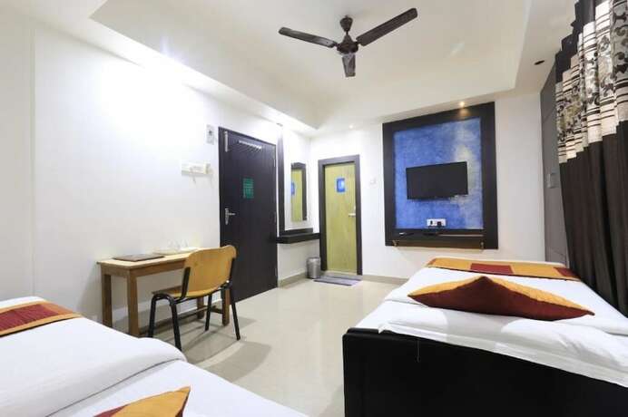 Imagen de la habitación del Hotel Rashmi. Foto 17