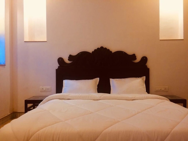 Imagen de la habitación del Hotel Rasik Priya Resort. Foto 11