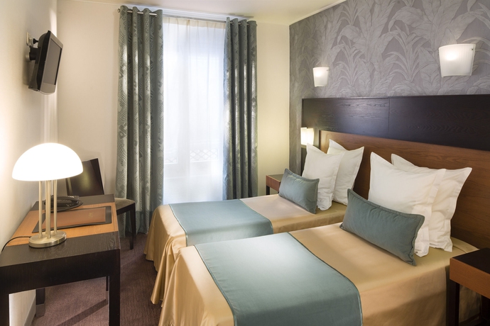 Imagen de la habitación del Hotel Raspail Montparnasse. Foto 10