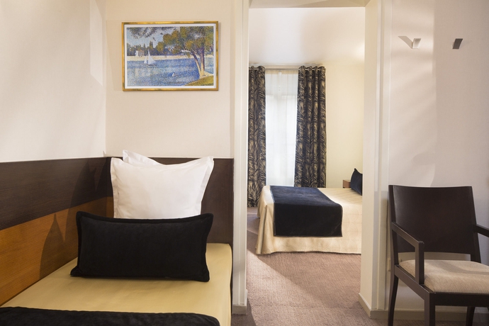 Imagen de la habitación del Hotel Raspail Montparnasse. Foto 11