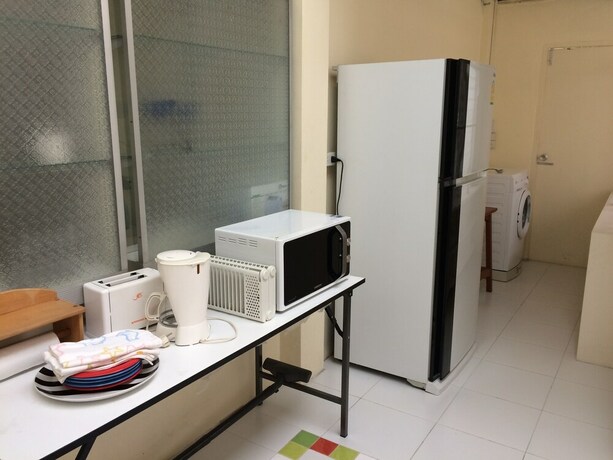 Imagen de la habitación del Hotel Ratchayothin Cottage. Foto 11