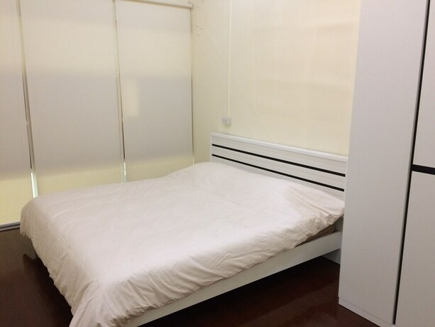 Imagen de la habitación del Hotel Ratchayothin Cottage. Foto 12