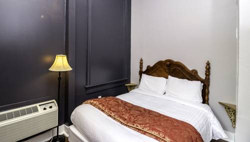 Imagen de la habitación del Hotel Rathbone Mansions. Foto 7