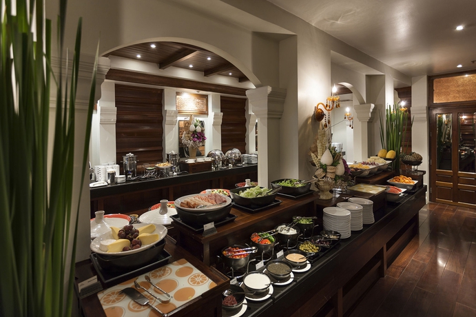 Imagen del bar/restaurante del Hotel Ratilanna Riverside Spa Resort. Foto 2