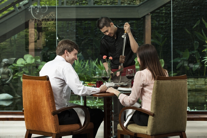 Imagen del bar/restaurante del Hotel Ratilanna Riverside Spa Resort. Foto 4