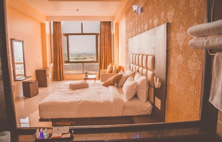 Imagen de la habitación del Hotel Ratnaa Resort. Foto 13