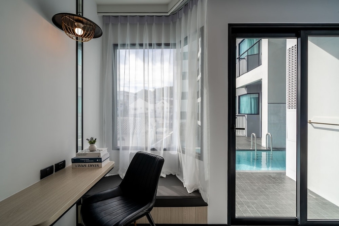 Imagen de la habitación del Hotel Ratri Hotel Phuket Old Town. Foto 13