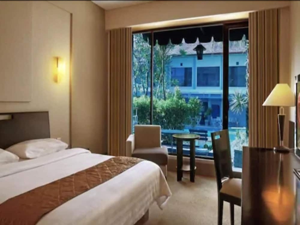 Imagen de la habitación del Hotel Rattan Inn. Foto 11