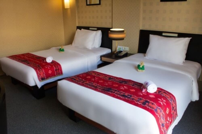 Imagen de la habitación del Hotel Rattan Inn. Foto 12