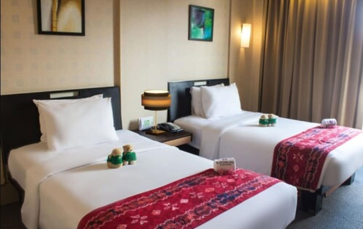 Imagen de la habitación del Hotel Rattan Inn. Foto 13