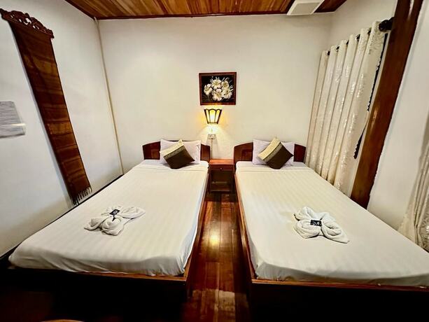 Imagen de la habitación del Hotel Rattana Guesthouse. Foto 32