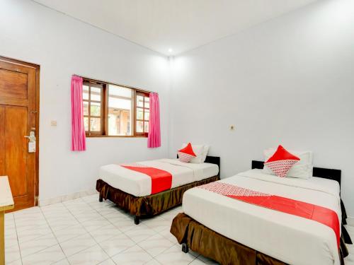 Imagen de la habitación del Hotel Ratu. Foto 11