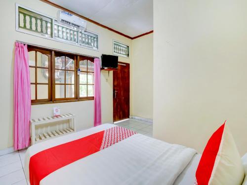 Imagen de la habitación del Hotel Ratu. Foto 16
