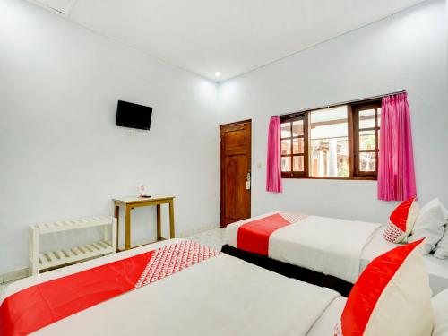 Imagen de la habitación del Hotel Ratu. Foto 20