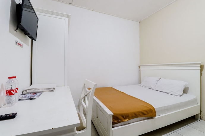 Imagen de la habitación del Hotel Ratu Guesthouse. Foto 2