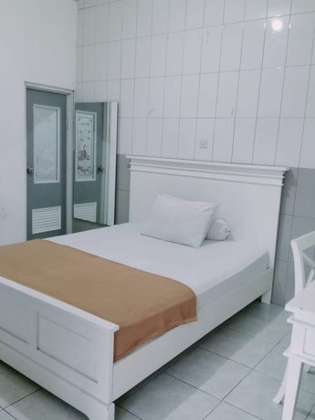 Imagen de la habitación del Hotel Ratu Guesthouse. Foto 4