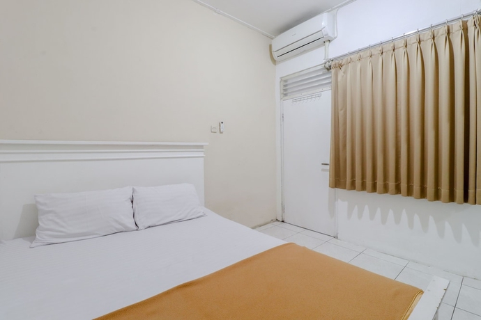 Imagen de la habitación del Hotel Ratu Guesthouse. Foto 5