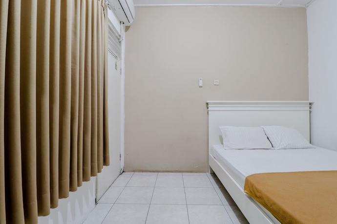 Imagen de la habitación del Hotel Ratu Guesthouse. Foto 7