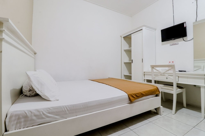 Imagen de la habitación del Hotel Ratu Guesthouse. Foto 8