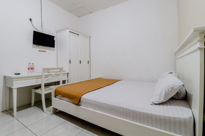 Imagen de la habitación del Hotel Ratu Guesthouse. Foto 9
