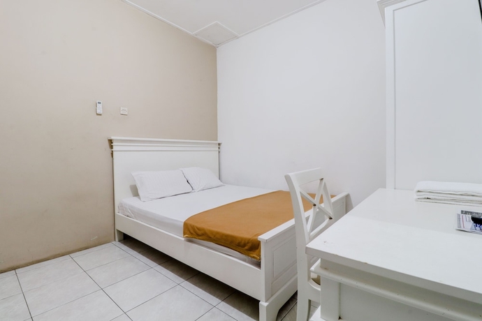 Imagen de la habitación del Hotel Ratu Guesthouse. Foto 10