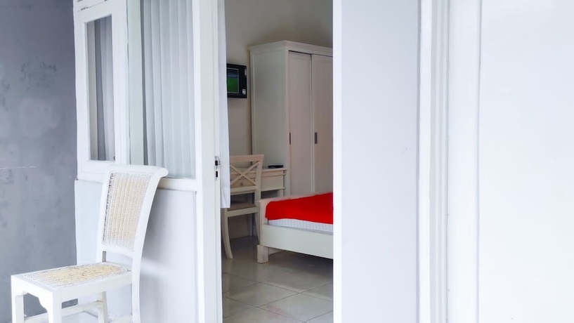 Imagen de la habitación del Hotel Ratu Guesthouse. Foto 11