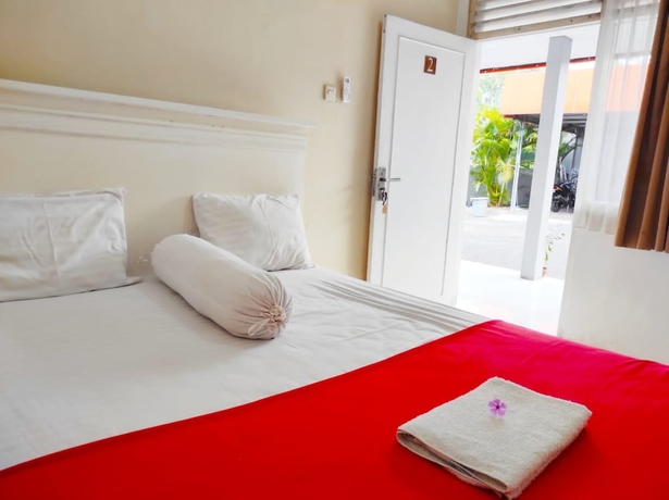 Imagen de la habitación del Hotel Ratu Guesthouse. Foto 12