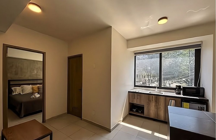Imagen de la habitación del Hotel Rau Departamentos. Foto 2