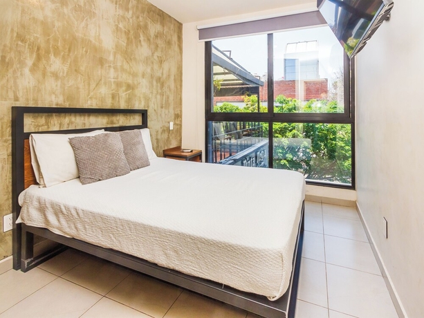 Imagen de la habitación del Hotel Rau Departamentos. Foto 3