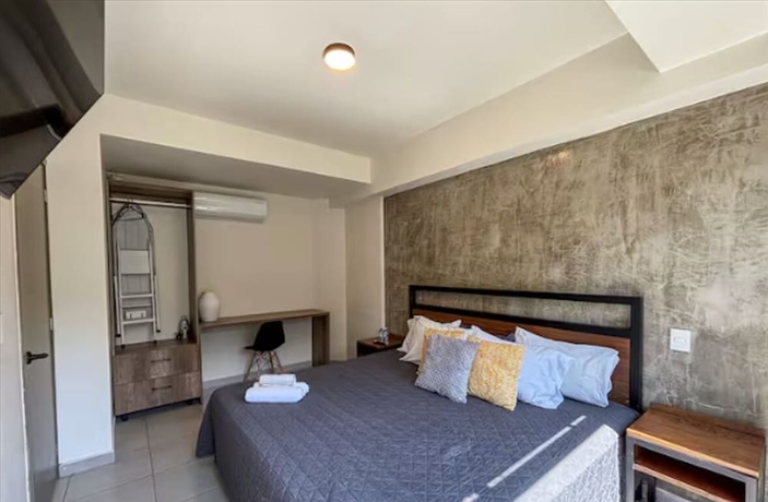 Imagen de la habitación del Hotel Rau Departamentos. Foto 11