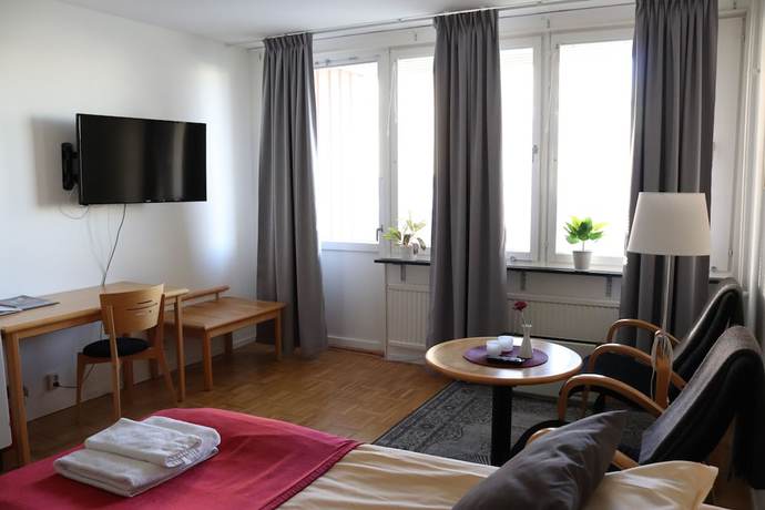 Imagen de la habitación del Hotel R&auml;ddningsskolans l&auml;genhetshotell. Foto 7