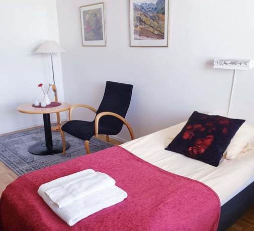Imagen de la habitación del Hotel R&auml;ddningsskolans l&auml;genhetshotell. Foto 13