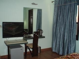 Imagen de la habitación del Hotel Raunak Plaza. Foto 7