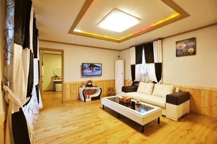 Imagen de la habitación del Hotel Ravie Pension. Foto 2