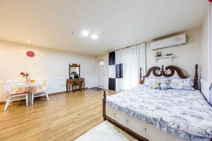 Imagen de la habitación del Hotel Ravie Pension. Foto 7