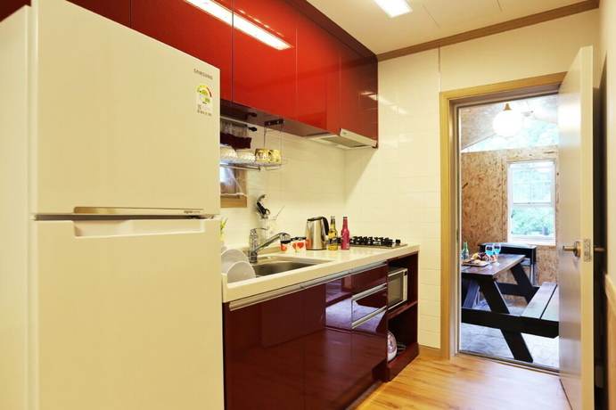 Imagen de la habitación del Hotel Ravie Pension. Foto 8