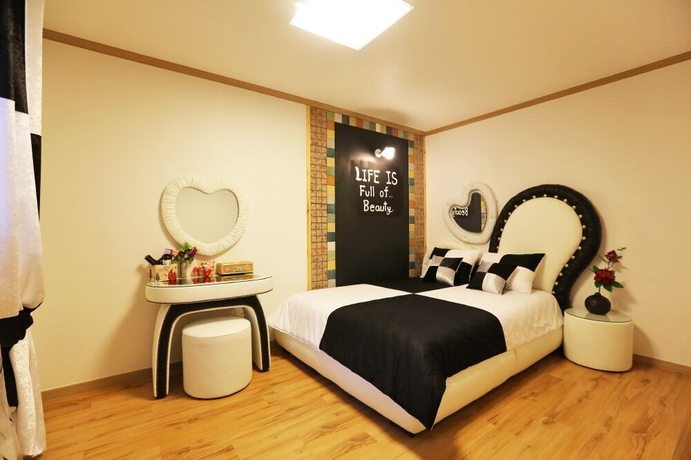 Imagen de la habitación del Hotel Ravie Pension. Foto 10