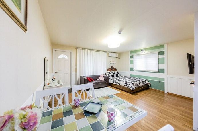 Imagen de la habitación del Hotel Ravie Pension. Foto 11