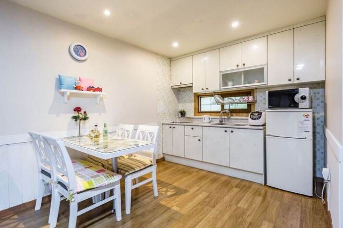 Imagen de la habitación del Hotel Ravie Pension. Foto 15