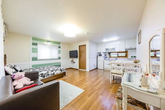 Imagen de la habitación del Hotel Ravie Pension. Foto 20