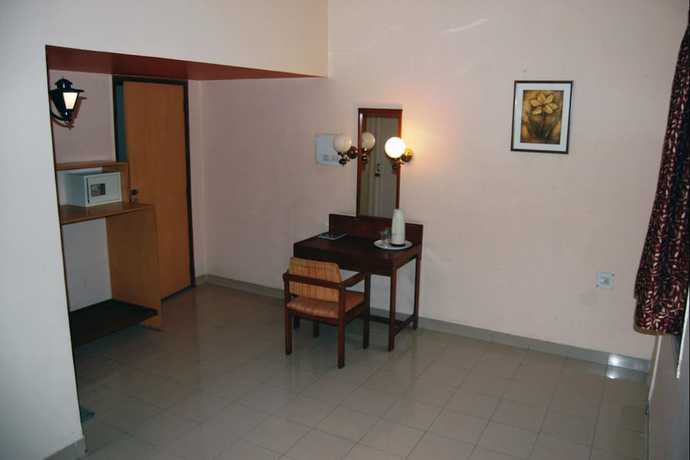Imagen de la habitación del Hotel Raviraj. Foto 14