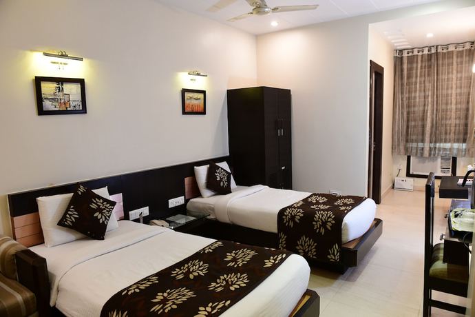 Imagen de la habitación del Hotel Ravisha Continental. Foto 9