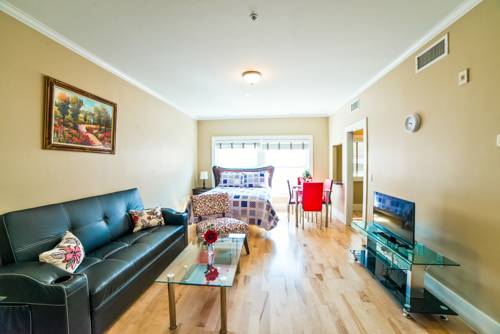Imagen de la habitación del Hotel Ray W. Suites. Foto 12
