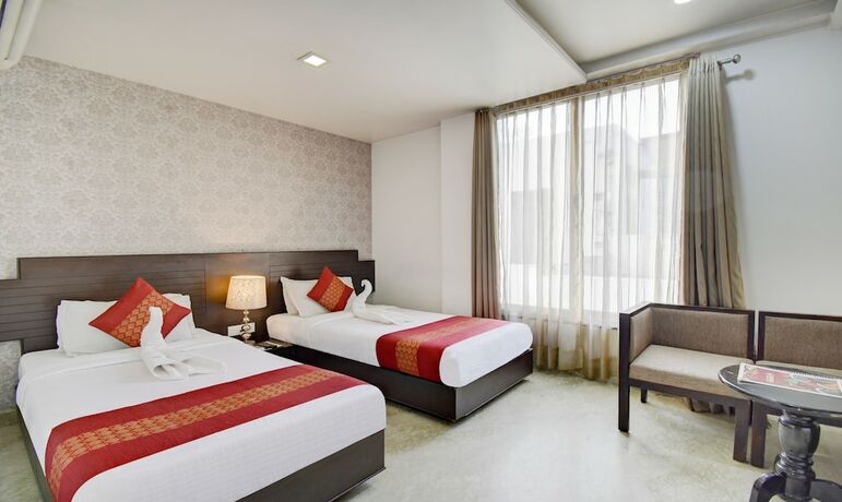 Imagen de la habitación del Hotel Raya Inn. Foto 17