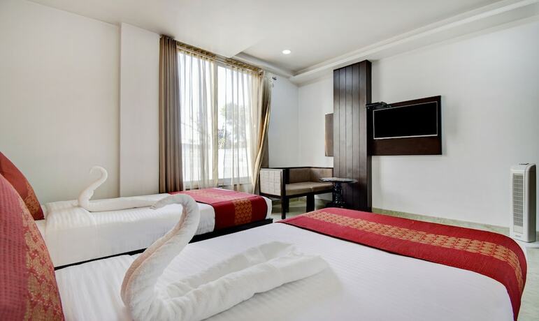 Imagen de la habitación del Hotel Raya Inn. Foto 18