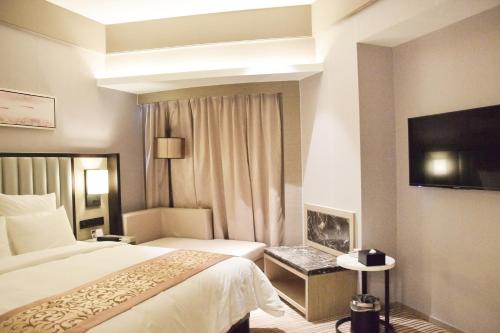 Imagen de la habitación del Hotel Rayfont Chengdu. Foto 6