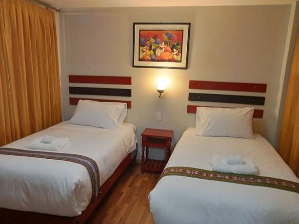 Imagen de la habitación del Hotel Raymi Inn MachuPicchu. Foto 12