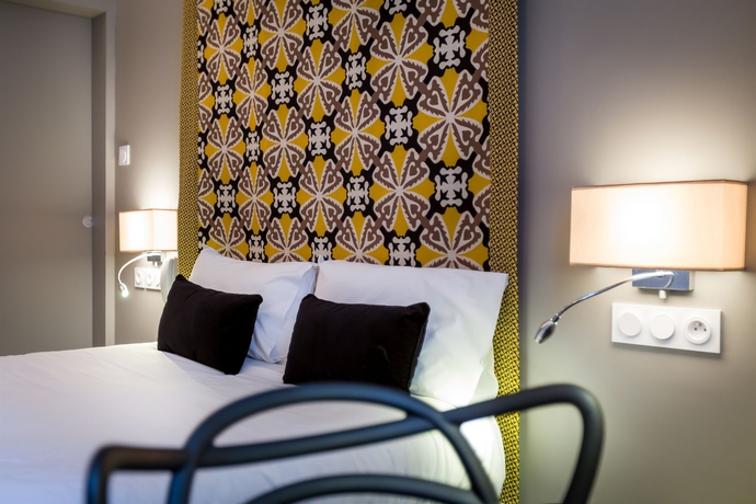 Imagen de la habitación del Hotel Raymond 4 Toulouse. Foto 2