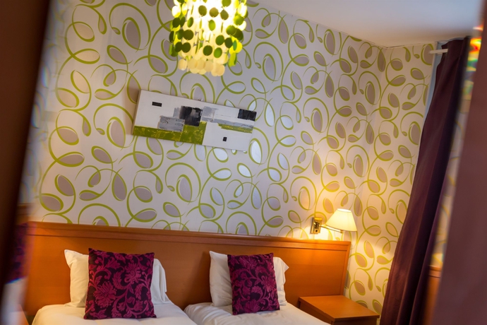 Imagen de la habitación del Hotel Raymond 4 Toulouse. Foto 7